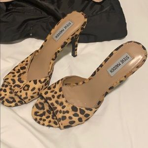 Leopard print kitty heels.